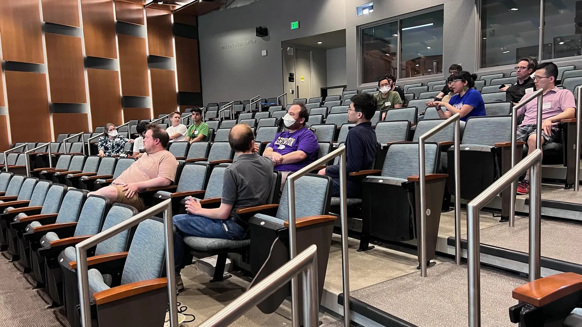 Students and faculty engaged in a Q & A session