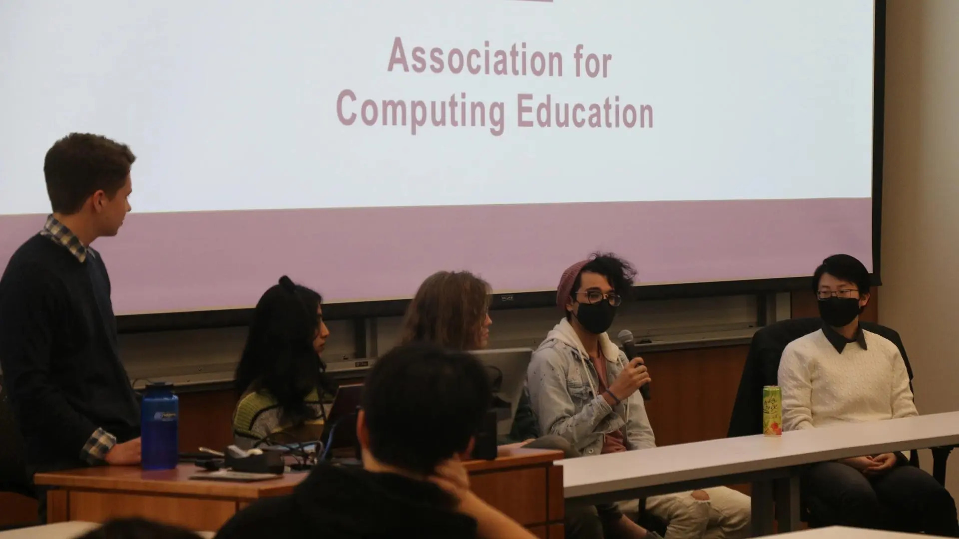 Panel of TAs answering a question