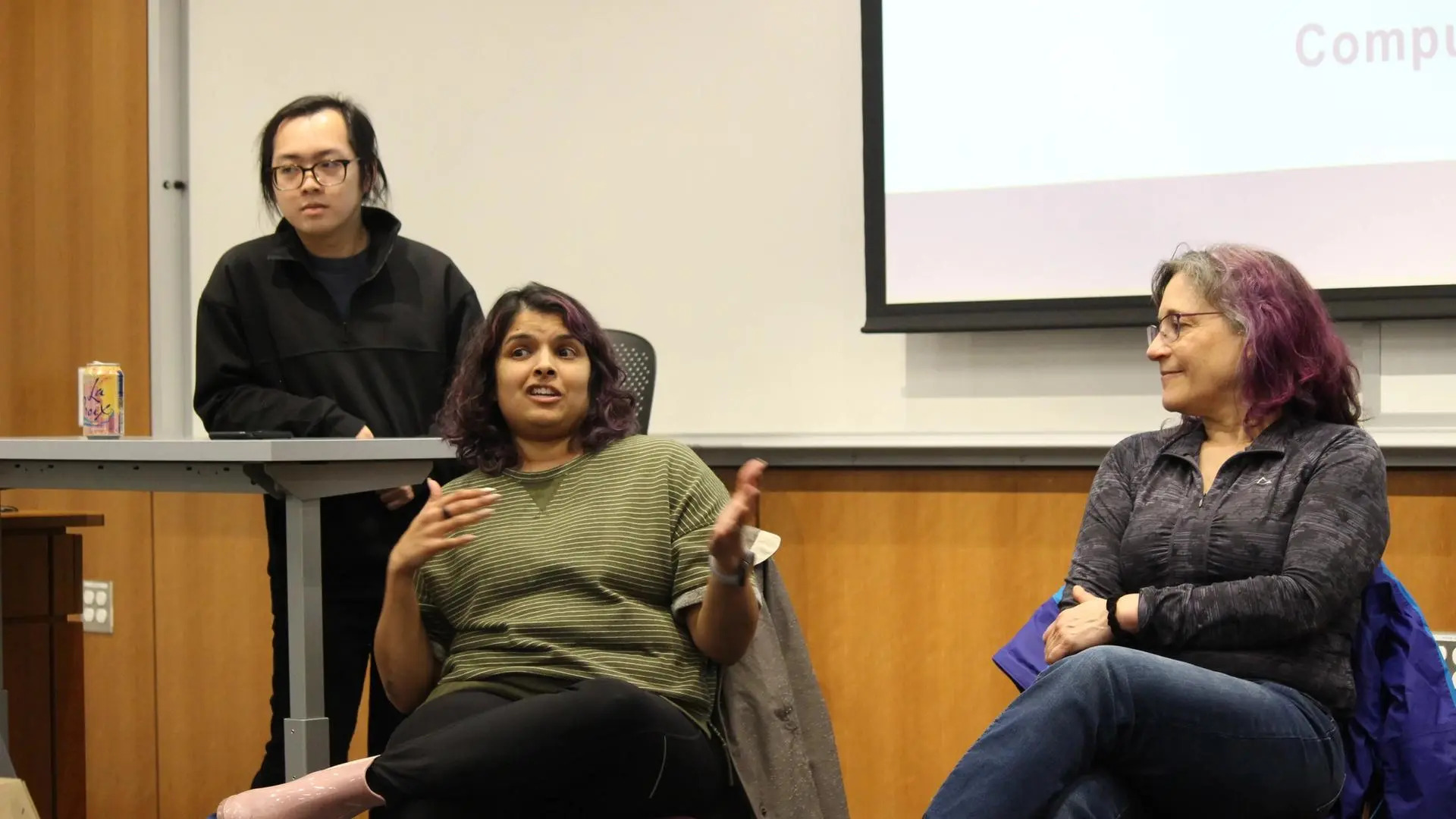 Close up of two instructors from the panel answering a question